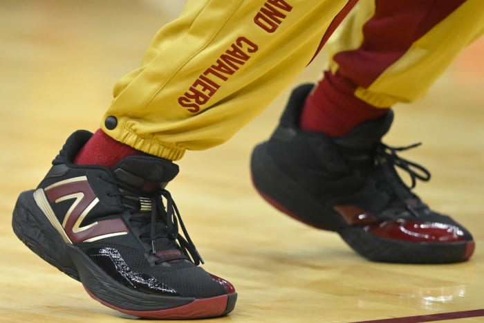 Cleveland Cavaliers guard Darius Garland's black and gold New Balance sneakers.